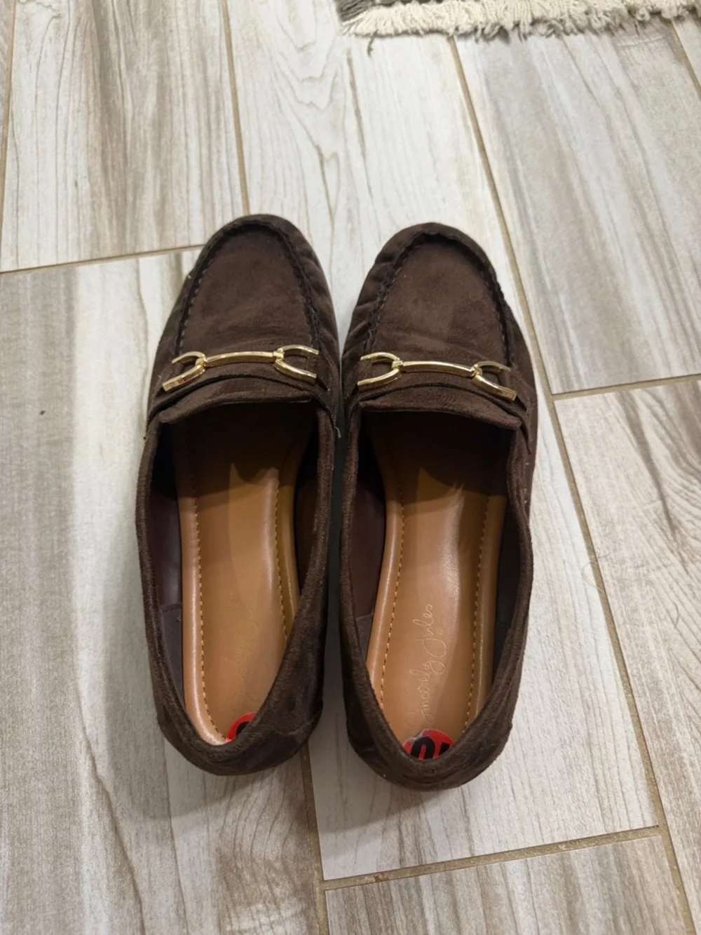 Brown suede look loafers with gold hardware